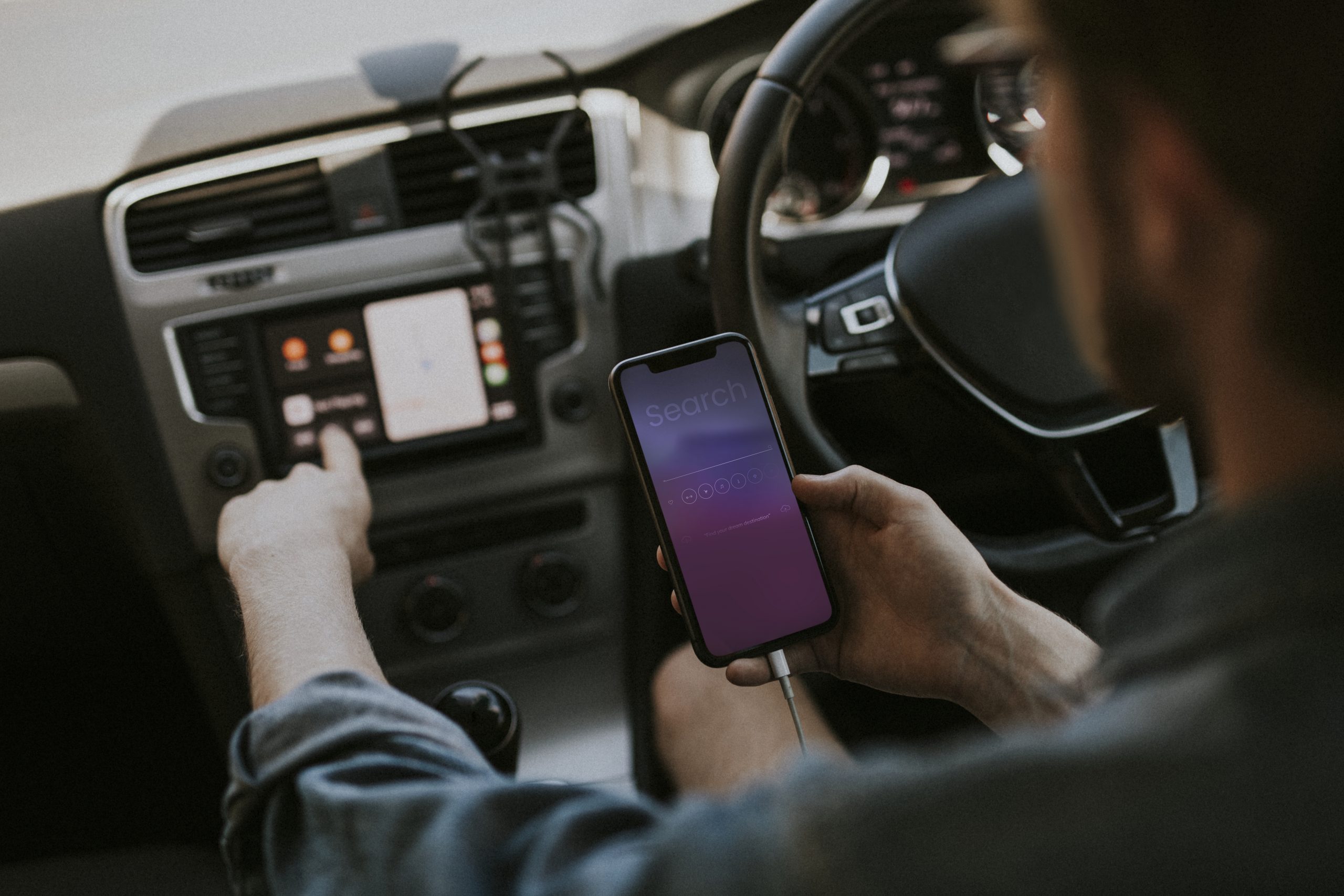 Driver using mobile phone searching an information